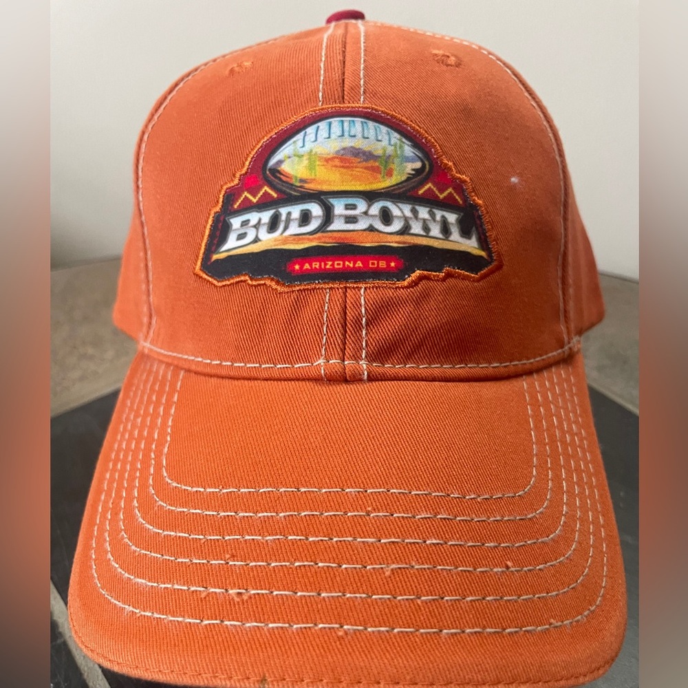 Orange and Red BUD BOWL cap.